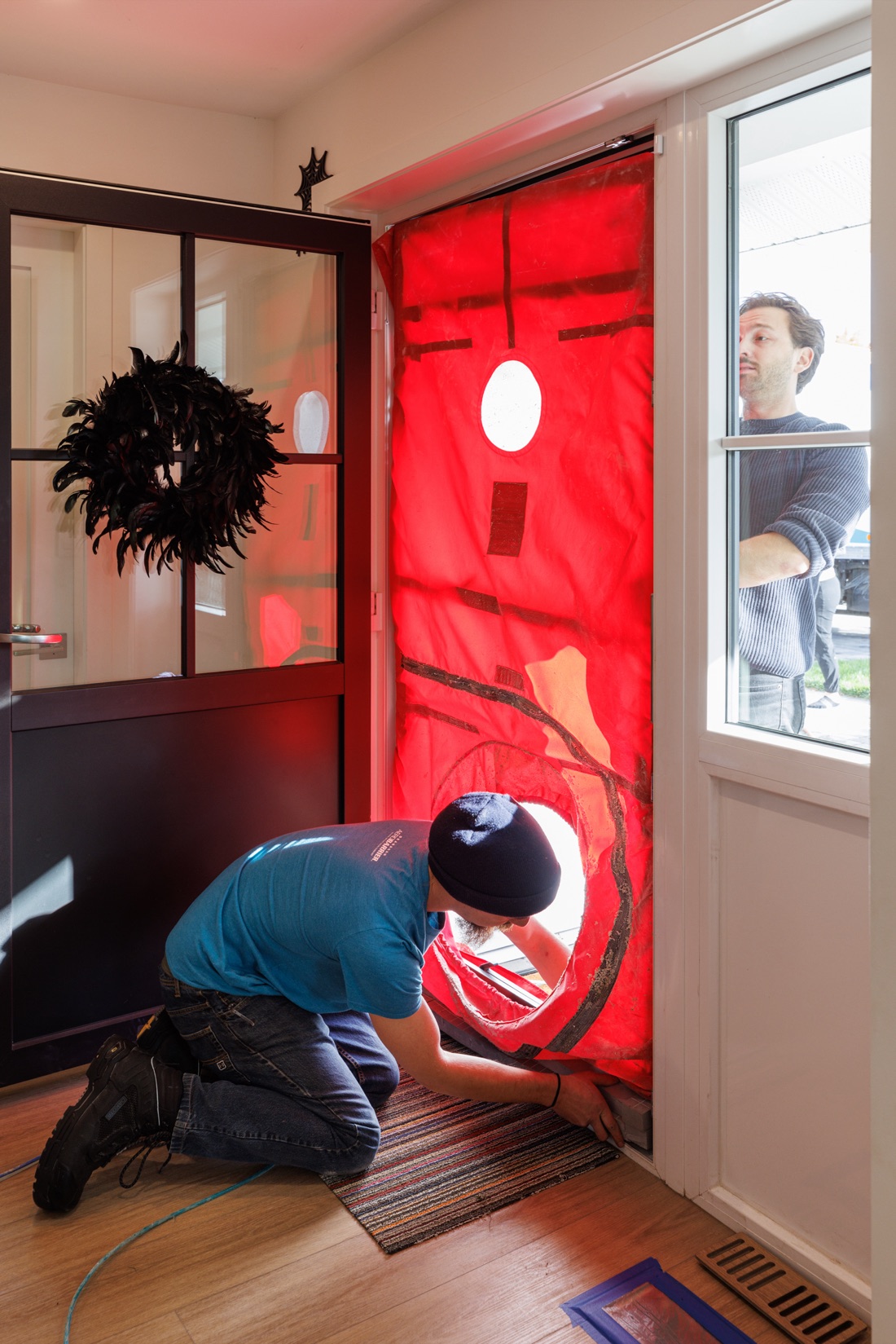 Blower-door airtightness test set up in a home